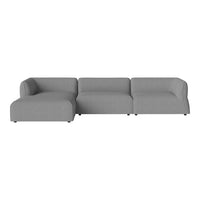 Modern light gray sectional sofa with a smooth, minimalist design and no noticeable patterns.