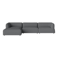 Gray sectional sofa with a smooth, modern fabric and minimalistic design, perfect for contemporary living spaces.