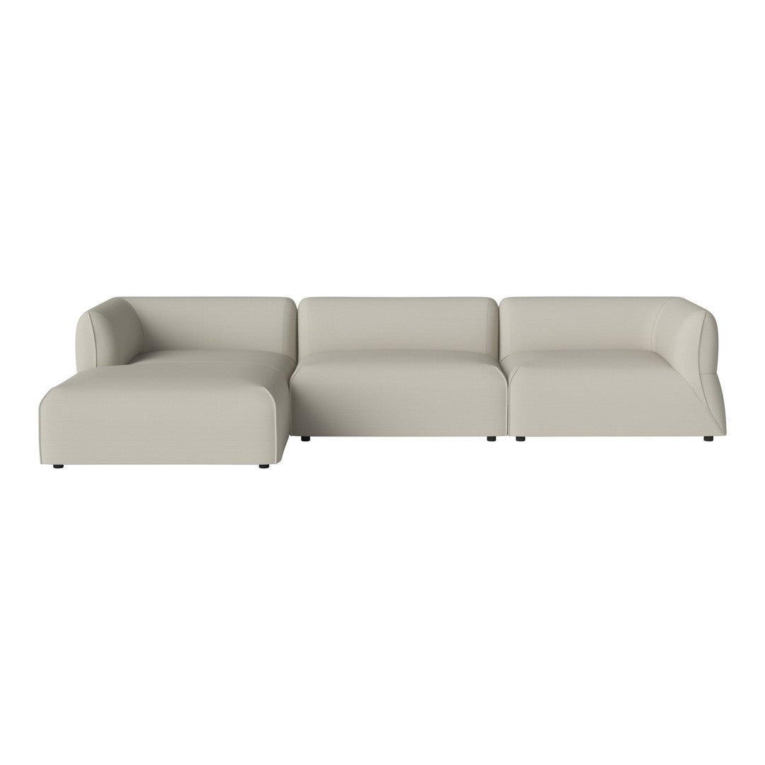 Light beige sectional sofa with a smooth, contemporary design and subtle upholstery texture. Perfect for modern decor.