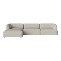 Light beige sectional sofa with a smooth, contemporary design and subtle upholstery texture. Perfect for modern decor.