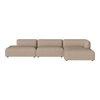 Beige sectional sofa with a modern, minimalist design and soft textured fabric. Ideal for contemporary living spaces.