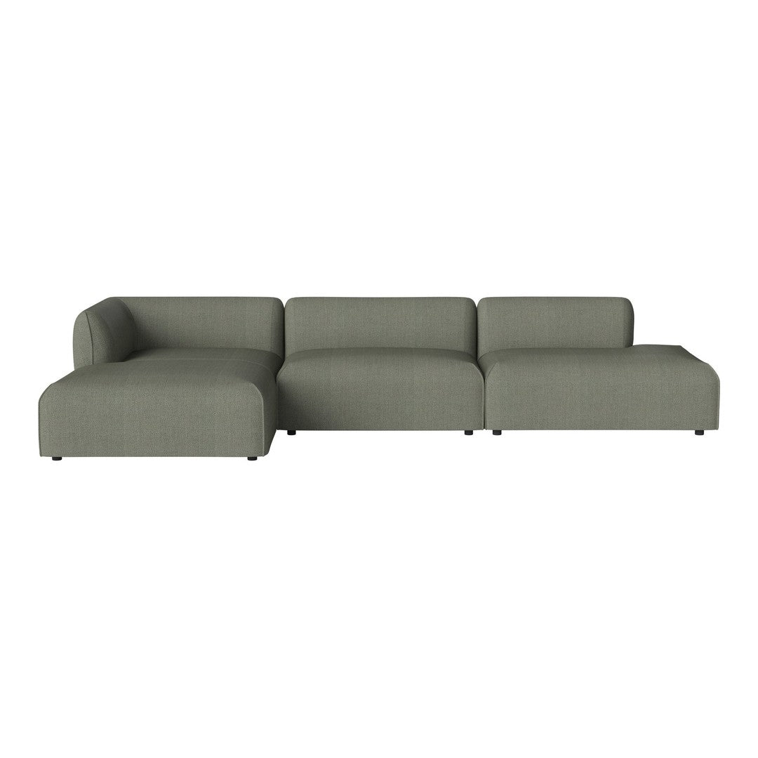 Light olive green sectional sofa with a sleek, modern design and minimalist silhouette.