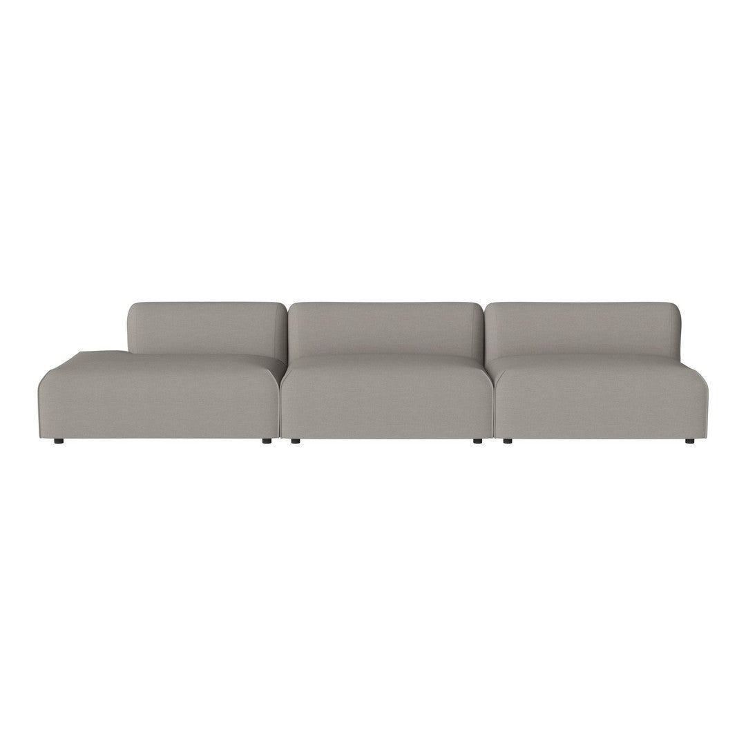 Modern sectional sofa in light gray upholstery, featuring a minimalist design with smooth, clean lines and no patterns.