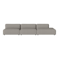 Light gray sectional sofa with a minimalist design and smooth upholstery, perfect for modern decor.