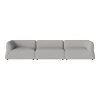Modern gray sectional sofa with a sleek, minimalist design and soft, smooth fabric. Ideal for contemporary decor.