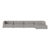 Gray sectional sofa with a minimalist design and smooth fabric texture. Perfect for modern living spaces.