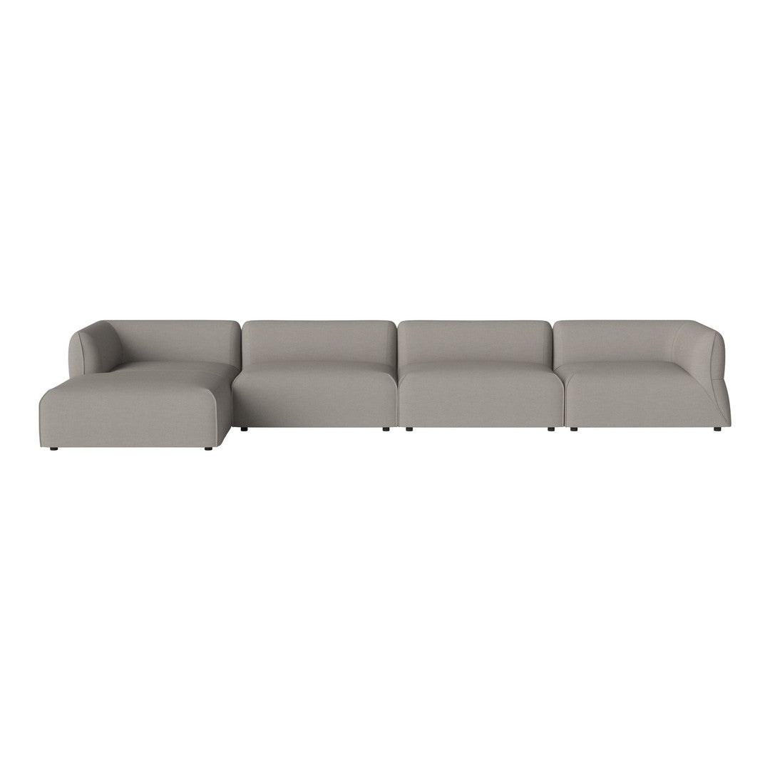 Modern gray sectional sofa with a smooth, minimalist design and subtle curves. Perfect for contemporary living spaces.