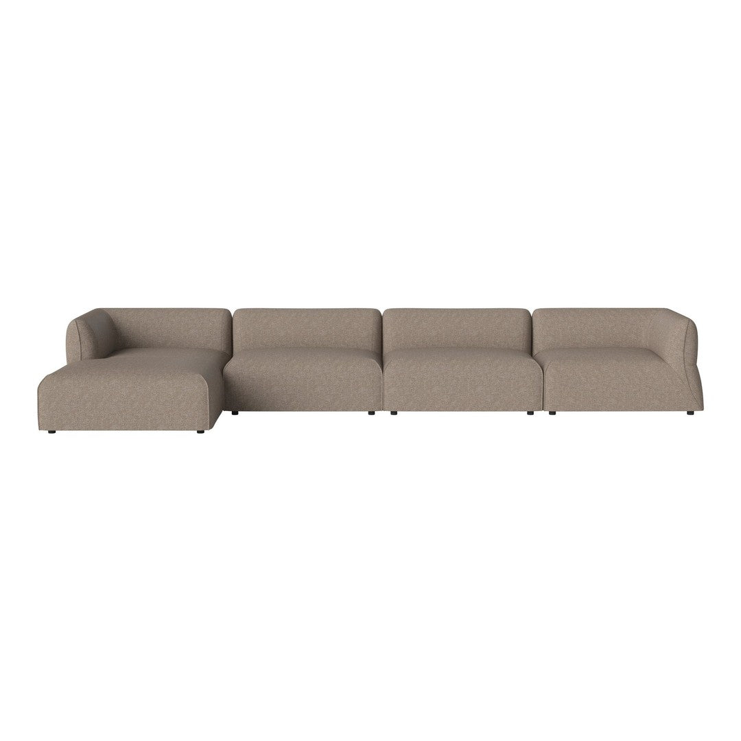 Modular sectional sofa in soft taupe fabric with a smooth, textured finish and clean lines.