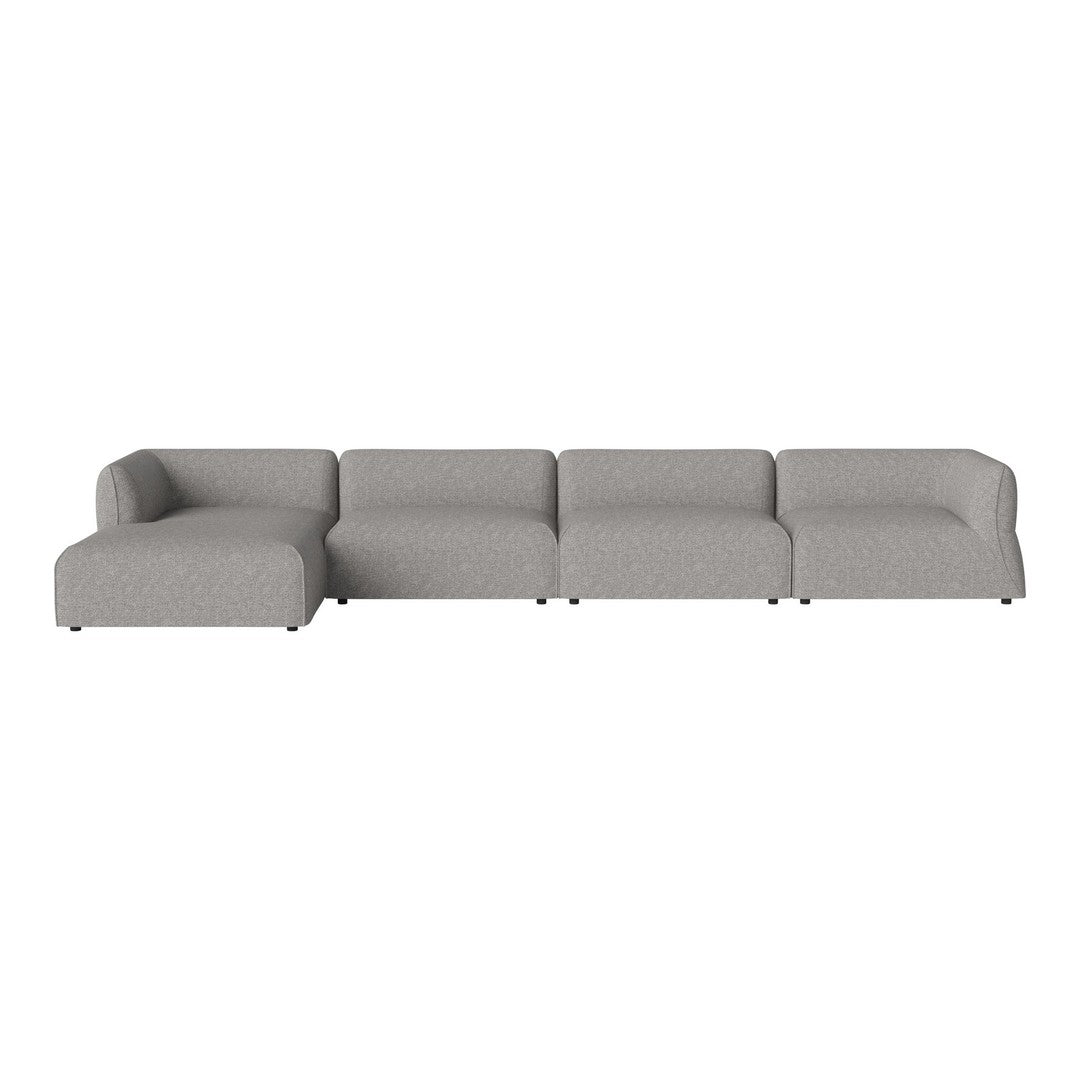 Stylish sectional sofa in a soft, muted gray fabric with clean lines and no visible patterns. Ideal for modern decor.