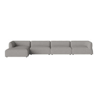 Stylish sectional sofa in a soft, muted gray fabric with clean lines and no visible patterns. Ideal for modern decor.