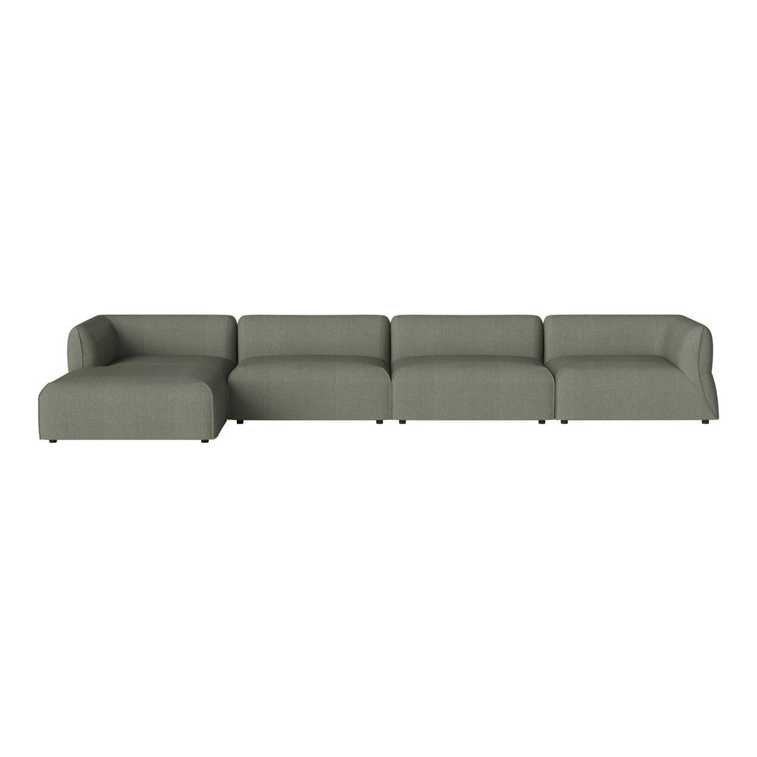 Sleek, modern sectional sofa in soft olive green fabric with a minimalist design. Ideal for contemporary spaces.
