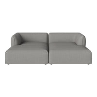 Gray modern sectional sofa with smooth texture and minimalist design, perfect for contemporary living spaces.