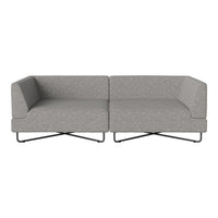 Gray fabric sectional sofa with a minimalist design and subtle textured pattern. Ideal for modern living spaces.
