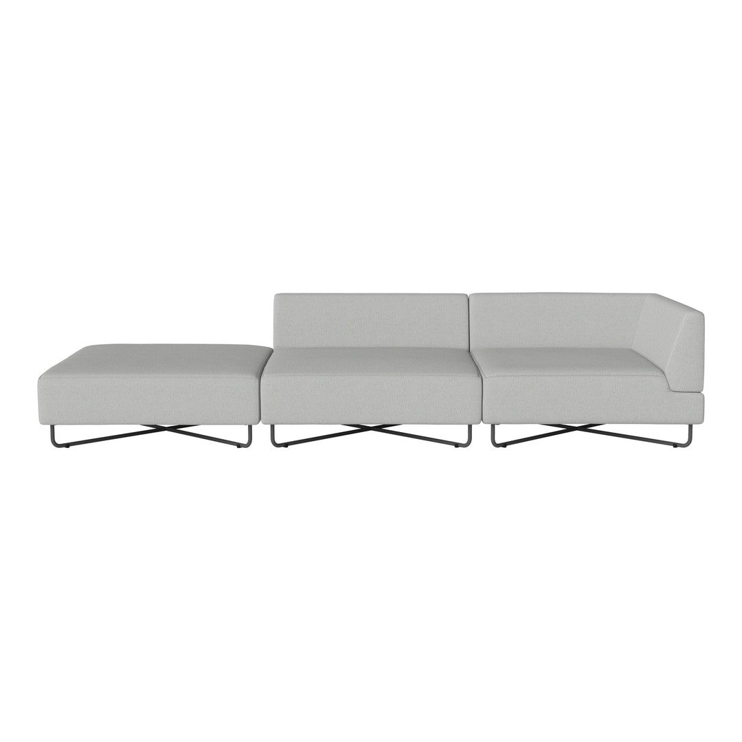 Modern gray sectional sofa with sleek lines and minimalist design, featuring a smooth, solid fabric upholstery.
