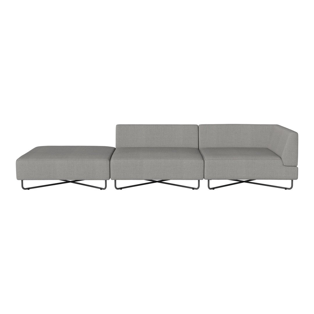 Modern gray sectional sofa with sleek lines and minimalist design, featuring a smooth fabric upholstery and metal legs.