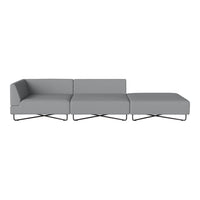 Modern gray sectional sofa with a sleek design and clean lines, featuring subtle fabric texture and metal accents.