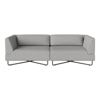 Stylish gray couch with minimalist design and sleek black legs, perfect for modern decor.
