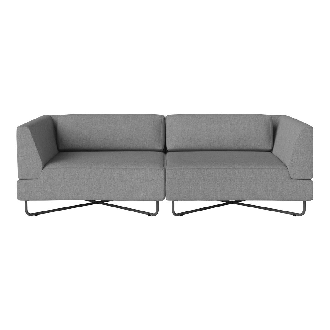 Modern gray sectional sofa with clean lines and minimalistic design, featuring a textured fabric and sleek black metal legs.