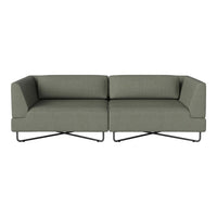 Modern two-seater sofa in muted green fabric with a textured pattern and sleek black metal legs.