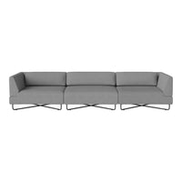Gray sectional sofa with smooth fabric and minimalist design, featuring sleek metal legs. Perfect for modern interiors.