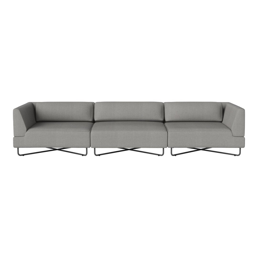 Gray sectional sofa with clean lines and modern design, featuring a neutral color palette and minimalistic detailing.