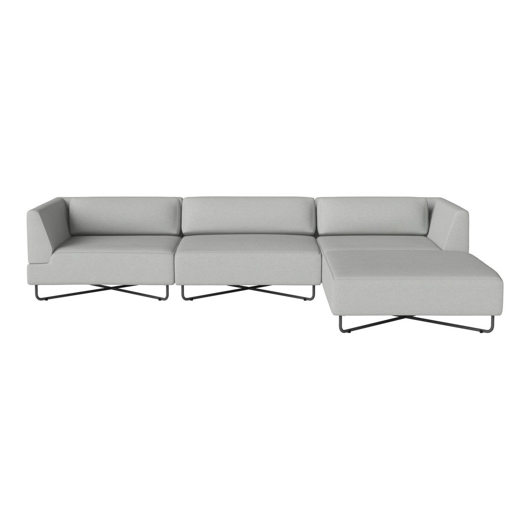 Modern gray sectional sofa with clean lines and minimalist design, featuring a sleek metal base and soft fabric upholstery.