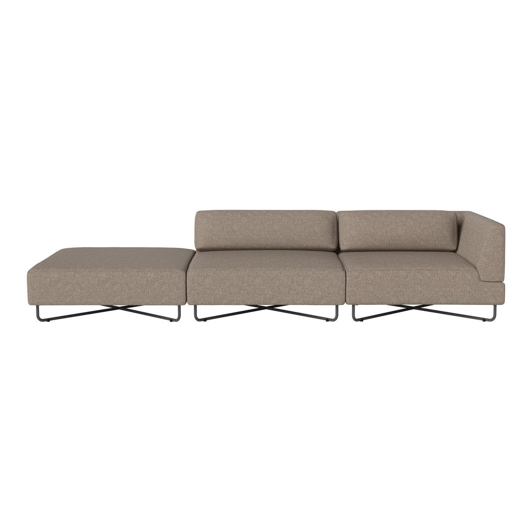 Contemporary sectional sofa in a soft taupe fabric with subtle texture, featuring sleek black metal legs.