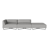 Gray sectional sofa with a modern design and clean lines, featuring smooth fabric and sleek metal legs.