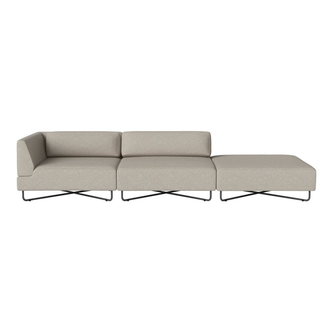 Light beige sectional sofa with a minimalist design and subtle, smooth fabric texture. Perfect for modern interiors.