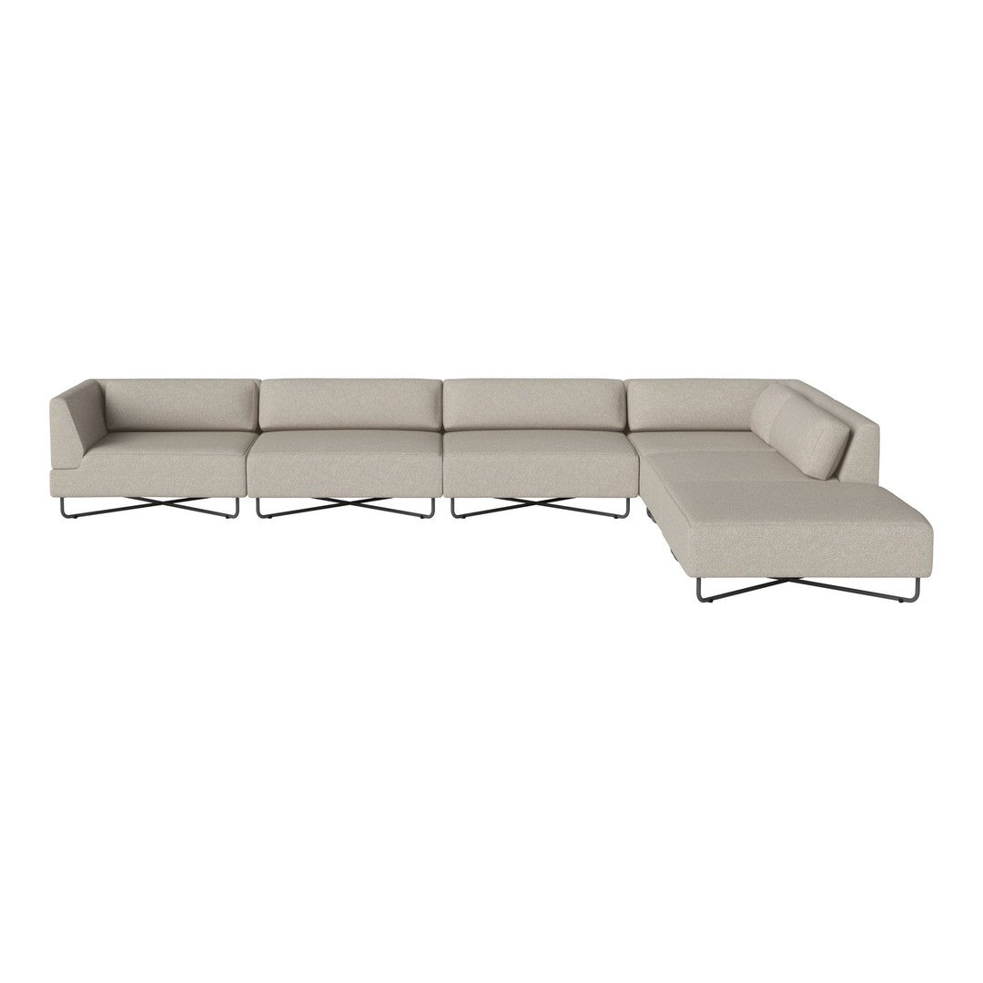 Light beige sectional sofa with a sleek, minimalist design and subtle, smooth fabric texture.
