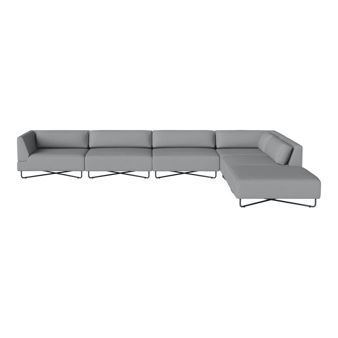 Modern gray sectional sofa with sleek lines and minimalist design, featuring solid gray upholstery and subtle texture.