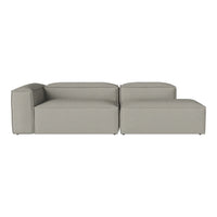 Modern grey sectional sofa with clean lines and a minimalist design, perfect for contemporary living spaces.