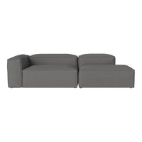 Modern gray sectional sofa with a clean, minimalistic design and soft, textured fabric. Perfect for any living space.