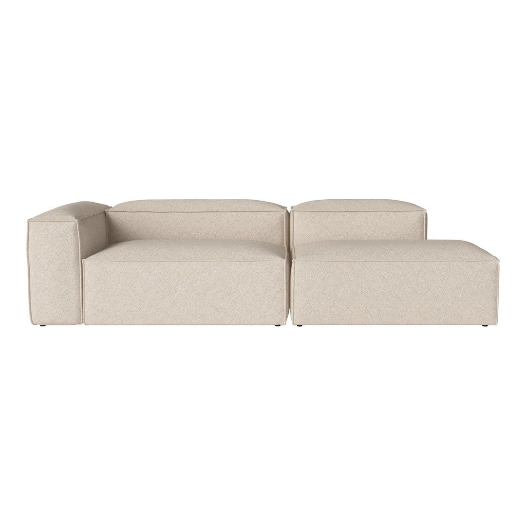 Beige upholstered sectional sofa with a modern, minimalist design and subtle texture. Ideal for contemporary decor.