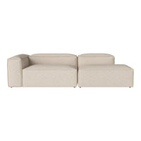 Beige upholstered sectional sofa with a modern, minimalist design and subtle texture. Ideal for contemporary decor.