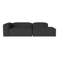 Modern L-shaped sectional sofa in a sleek dark gray fabric with a subtle textured pattern.