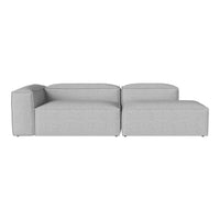 Light grey modular sofa with a textured fabric and minimalist design, perfect for modern living spaces.