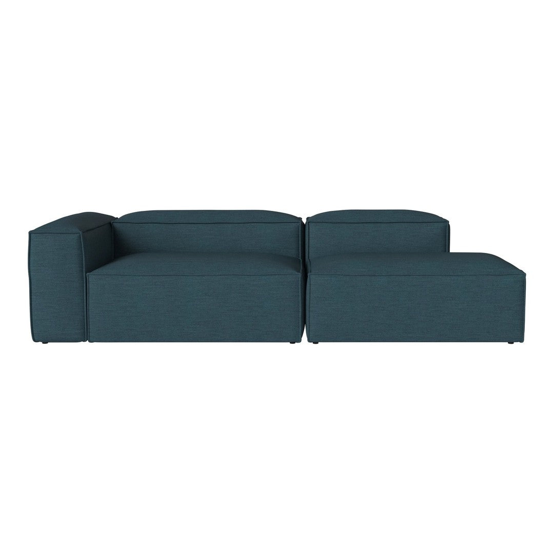 Teal modular sofa with a smooth, textured fabric pattern, showcasing modern design and versatility.