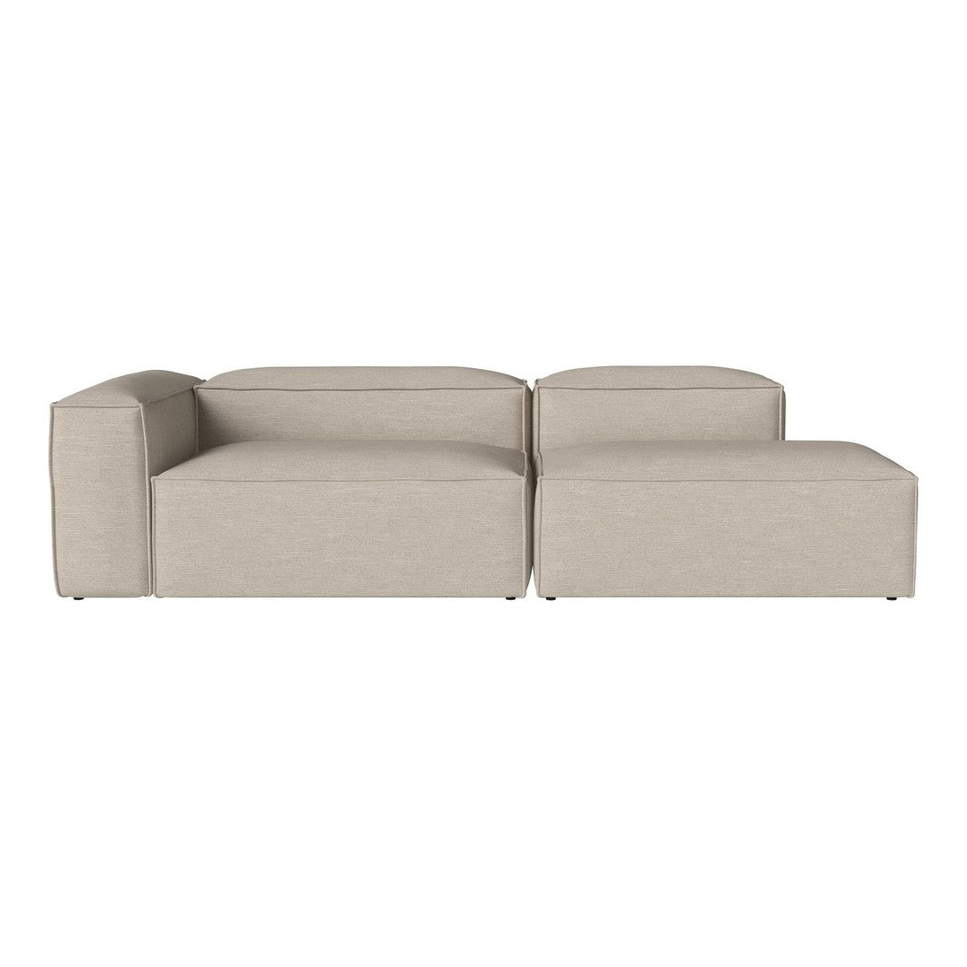 Beige modular sofa with a smooth fabric texture and minimalist design, perfect for modern living spaces.