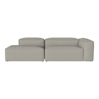 Gray sectional sofa with sleek, modern design and minimalist lines, perfect for contemporary living spaces.