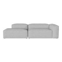 Modern grey sectional sofa with a clean, minimalist design and soft, textured fabric. Perfect for contemporary interiors.