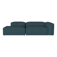 Teal fabric sectional sofa with clean lines and a modern minimalist design. Perfect for contemporary living spaces.
