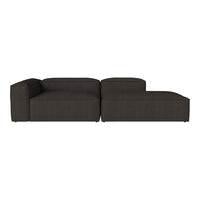 Modern sectional sofa in deep charcoal gray with a minimalist design and subtle textured pattern.