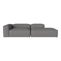 Modern gray sectional sofa with smooth, minimalist design and no visible patterns. Perfect for contemporary interiors.