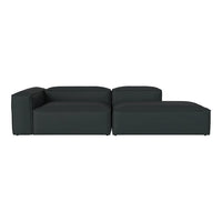 Modern sectional sofa in deep charcoal gray with a sleek, minimalistic design. Perfect for contemporary spaces.