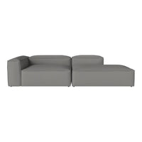 Modern grey sectional sofa with sleek lines and minimalist design, perfect for contemporary decor.