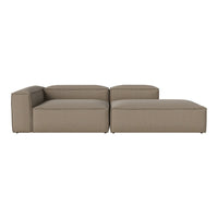 Tan sectional sofa with a smooth, contemporary design and subtle textured fabric pattern. Ideal for modern living spaces.