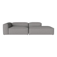 Gray modular sectional sofa with a smooth, minimalistic design and soft fabric upholstery. Perfect for modern interiors.