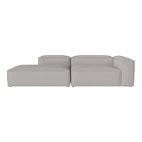 Light gray modular sofa with a minimalist design and clean lines, featuring a solid color without patterns.