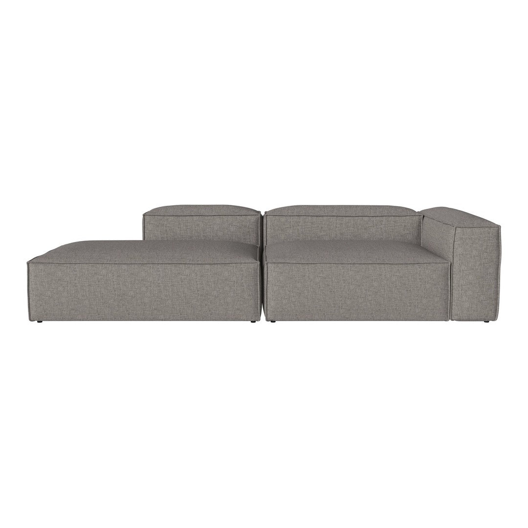Modern gray sectional sofa with a sleek, minimalist design and soft, textured fabric. Perfect for contemporary living spaces.